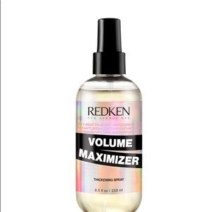 Brand new redken thickening spray.  I bought from Salon brand new never used